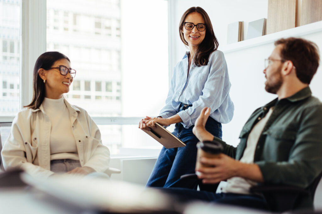 Team of professionals having a discussion in an office AdobeStock 608232890